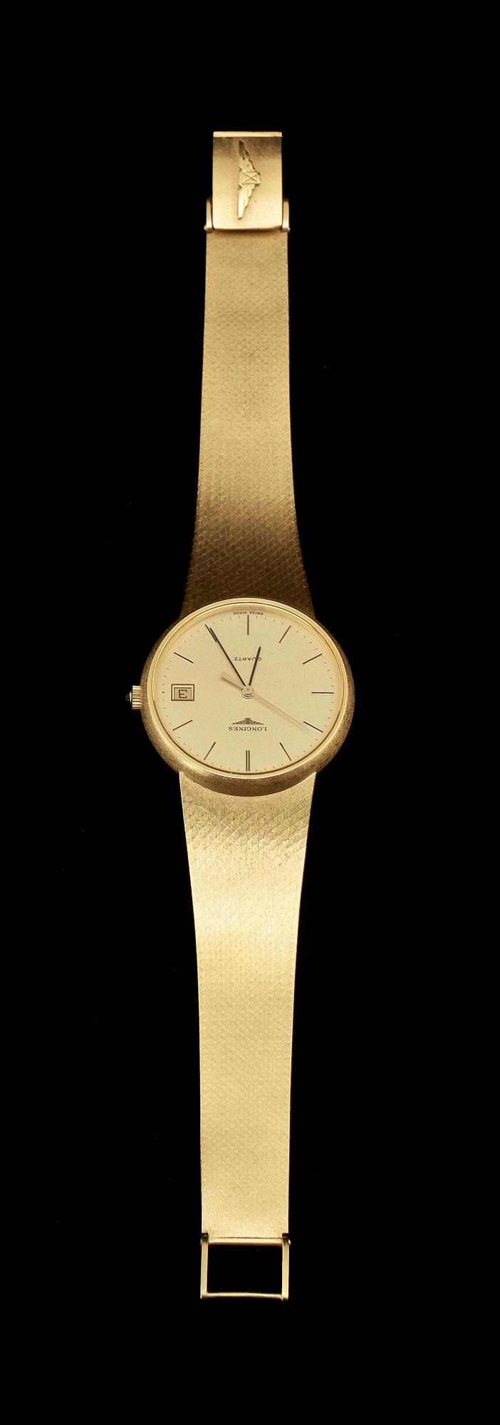 HERRARMBANDSUR, Longines, 18k guld med blå safirknopp, 1900-tal. Vikt 84 g.