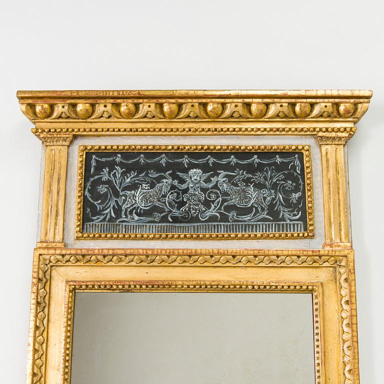 A mirror by Fredric Johan Foeder or Fjäder, (Master in Turku 1782-1832). Signed F.J.F and hallmarked in Turku.