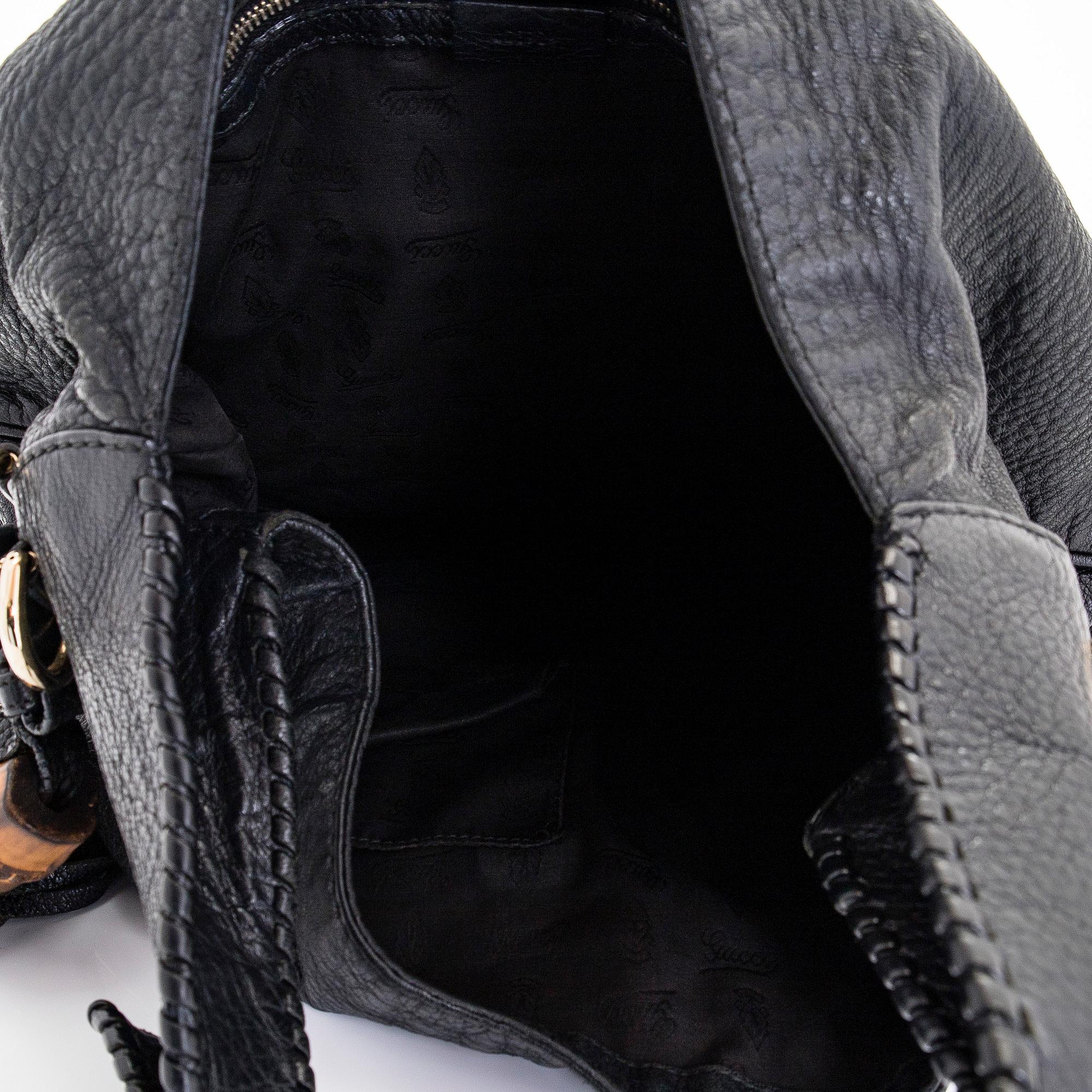 Gucci, a 'Bamboo Jackie Tassel' shoulder bag.