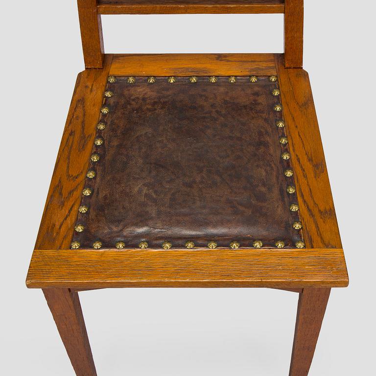 Dining table and six chairs, early 1900.