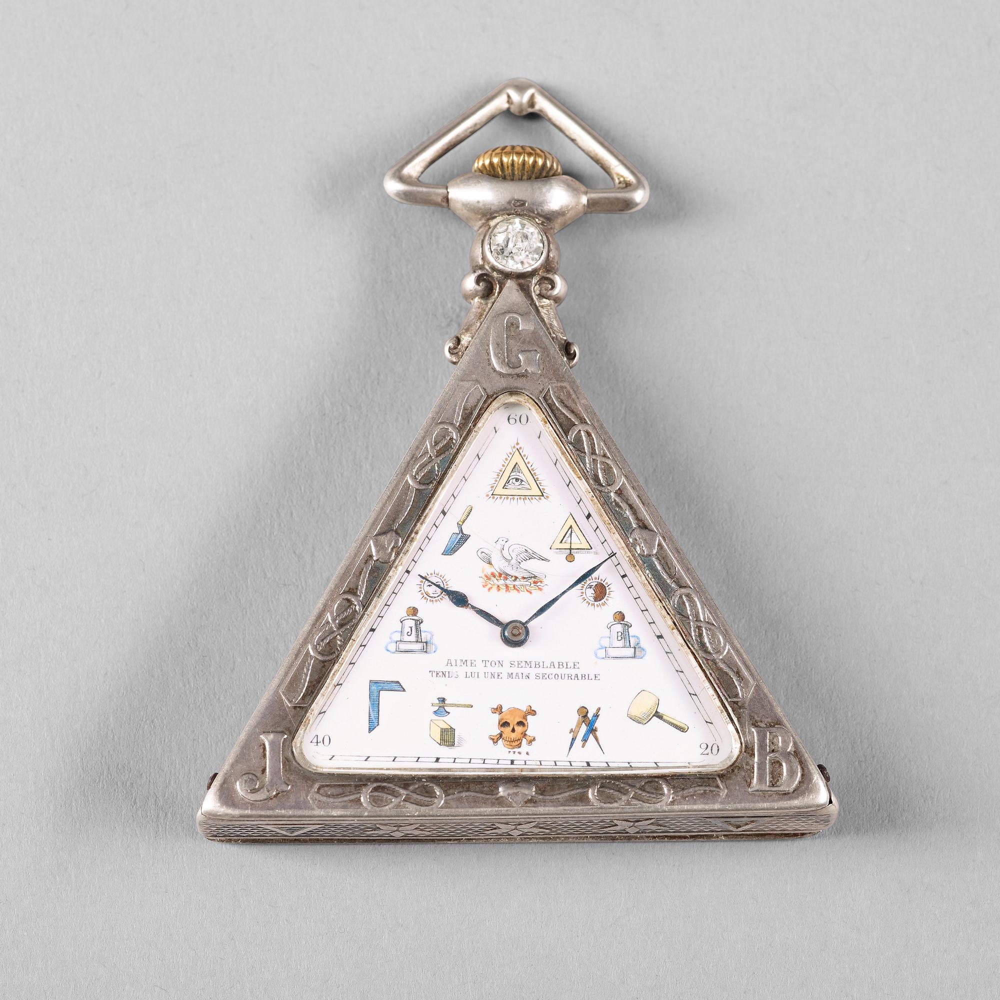 A silver triangular Masonic watch, Tempor Watch Co, ca 1940.