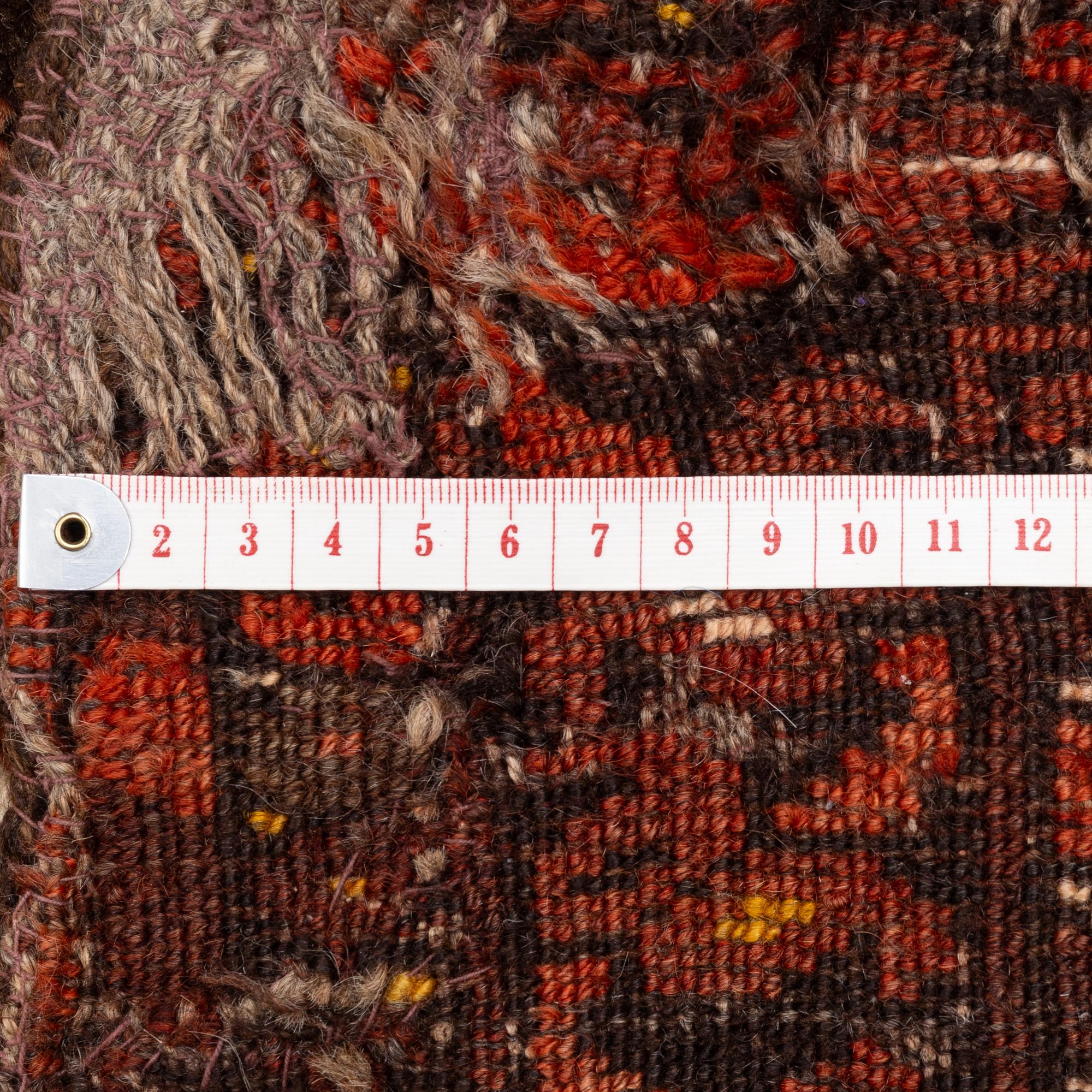 An antique Bechir rug, approx. 215 x 148 cm.