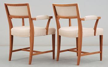A pair of Josef Frank mahogany dining chairs, Svenskt Tenn, model 695.