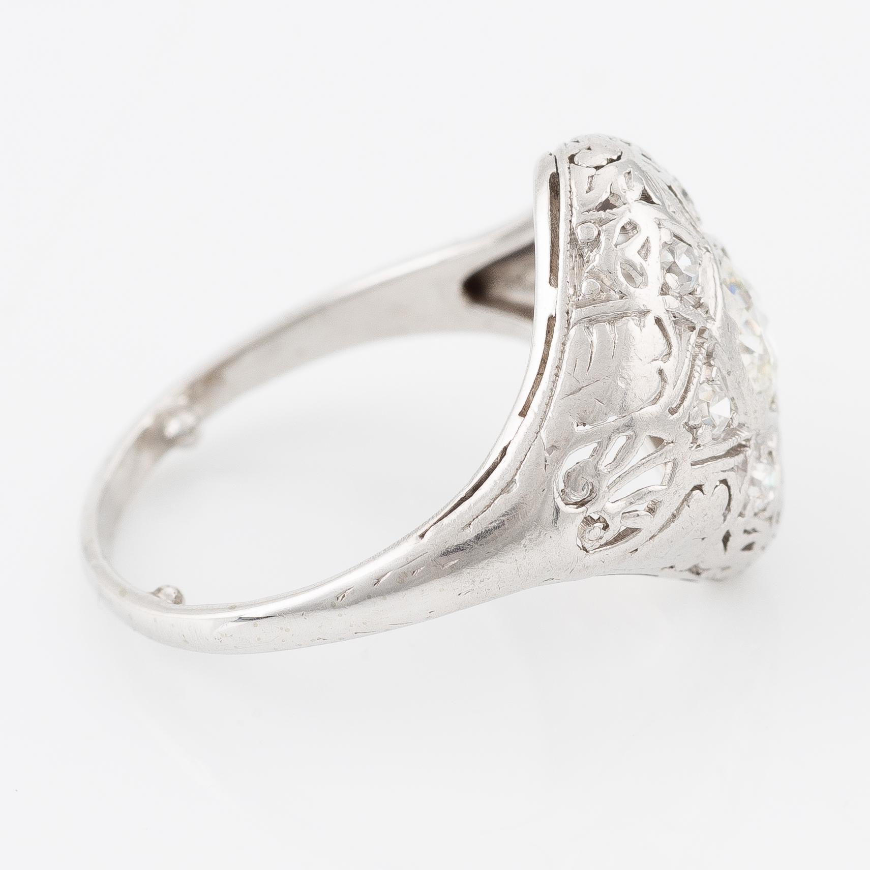 Ring with brilliant-cut diamond and octagon-cut diamonds.