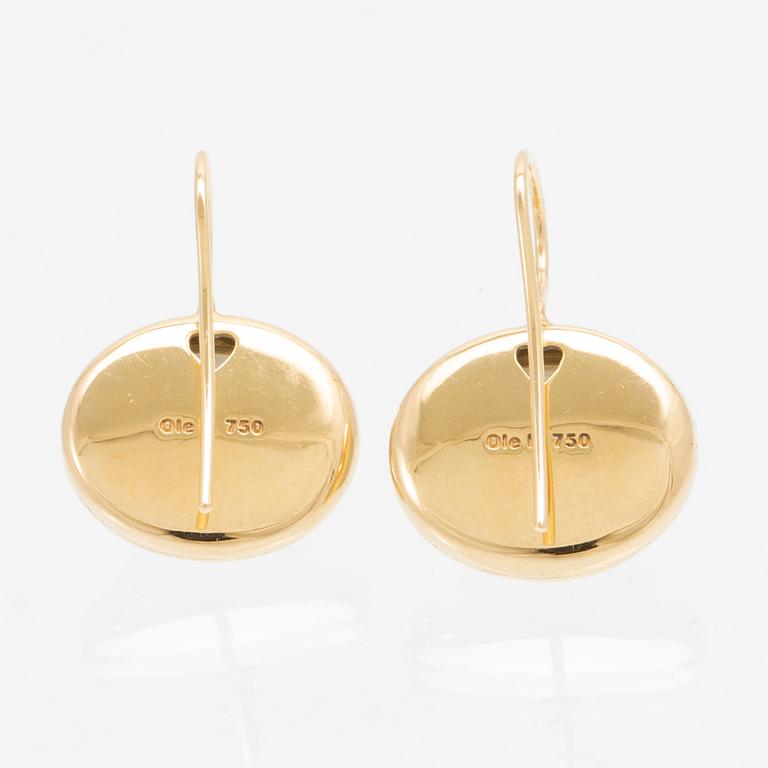 A pair of 18K gold earrings "Emeli" with cabochon-cut moonstone from Ole Lynggaard.