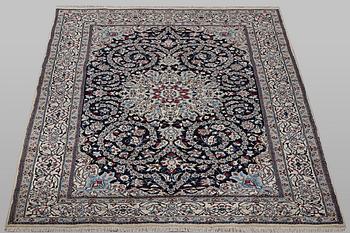 A carpet, Nain, part silk, 9 Laa, ca 295 x 197 cm.