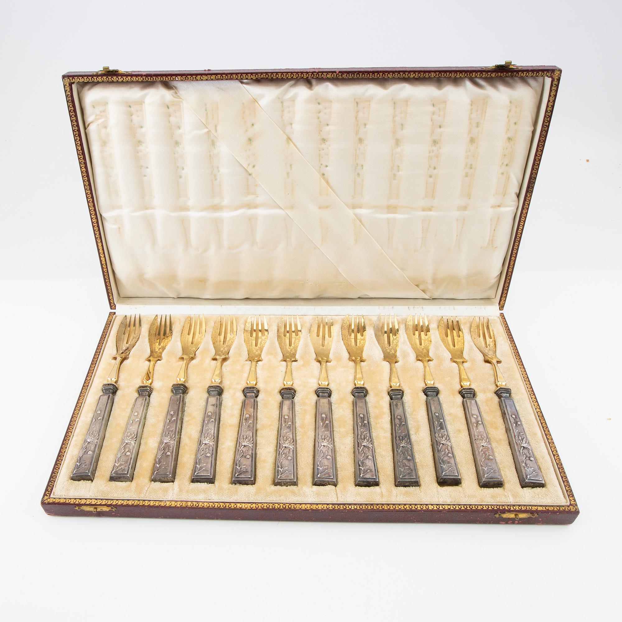 Fish cutlery silver 18 dlr, around the year 1900.