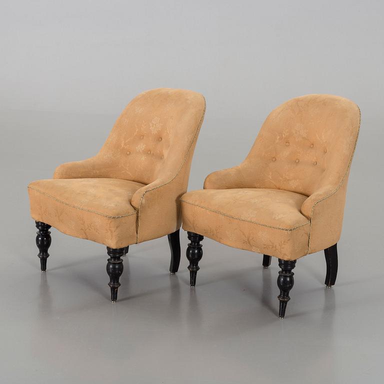 a pair of late 19th century easy chairs.