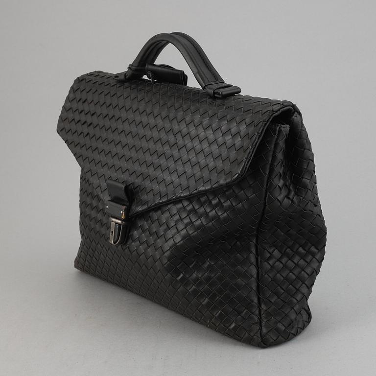 Bottega Veneta, a black intrecciato leather briefcase.