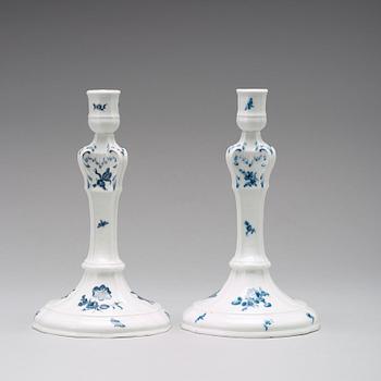 A pair of Berlin porcelain candle sticks, 18th Century.