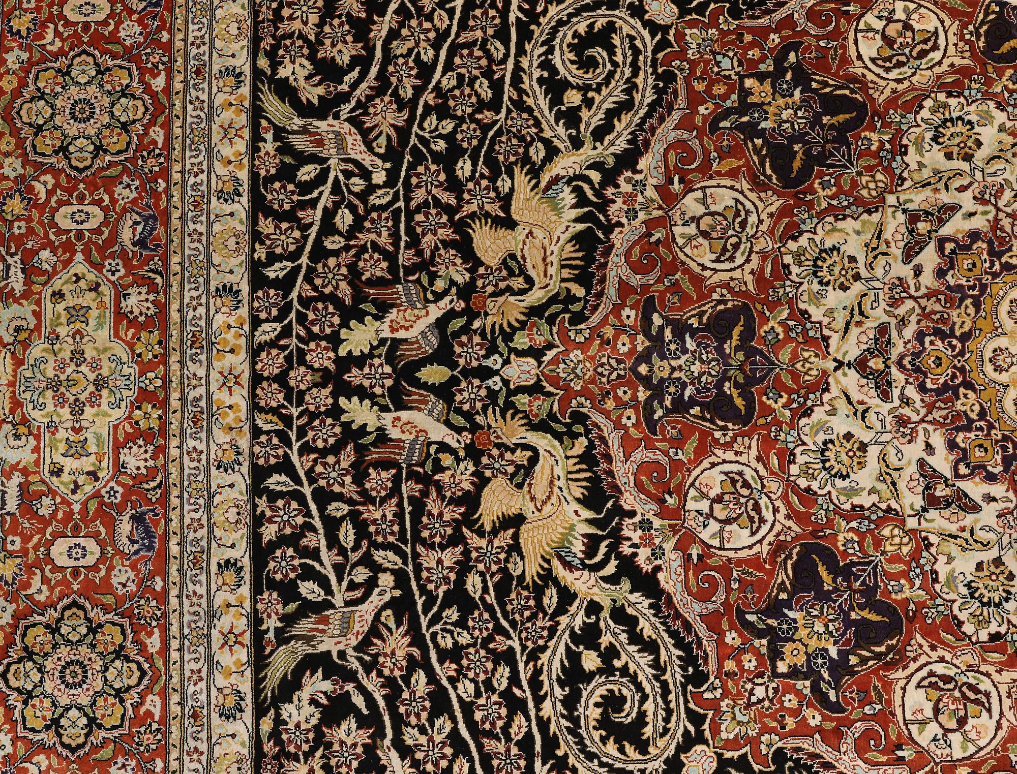 A oriental silk carpet, 303 x 201 cm.