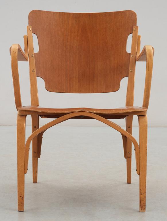 A Carl-Axel Acking mahogany and beech armchair, Svenska Möbelfabrikerna, Bodafors, Sweden 1940's.