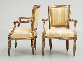 Two 18th century armchairs, probably Italian .