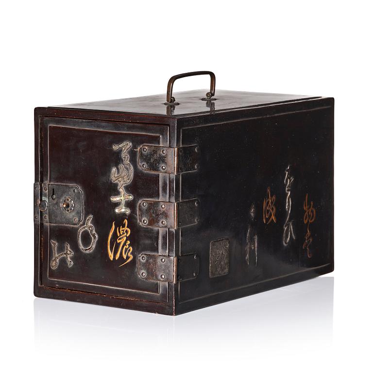 A black lacquer cabinet with poetic inscriptions, Edo Period, 17th Century.