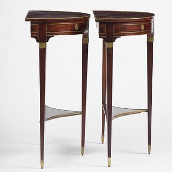 A pair of late Gustavian mahogany consoles in the manner of A. Lundelius, Stochkolm, late 18th century.