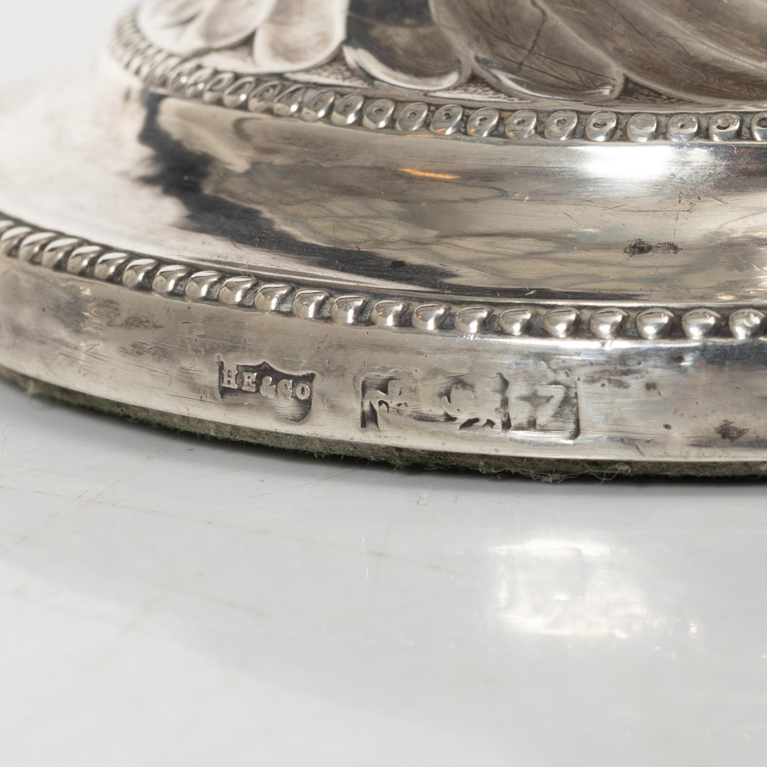 A pair of English silver candelabra, mark of Hawksworth, Eyre & Co Ltd, Sheffield 1892.