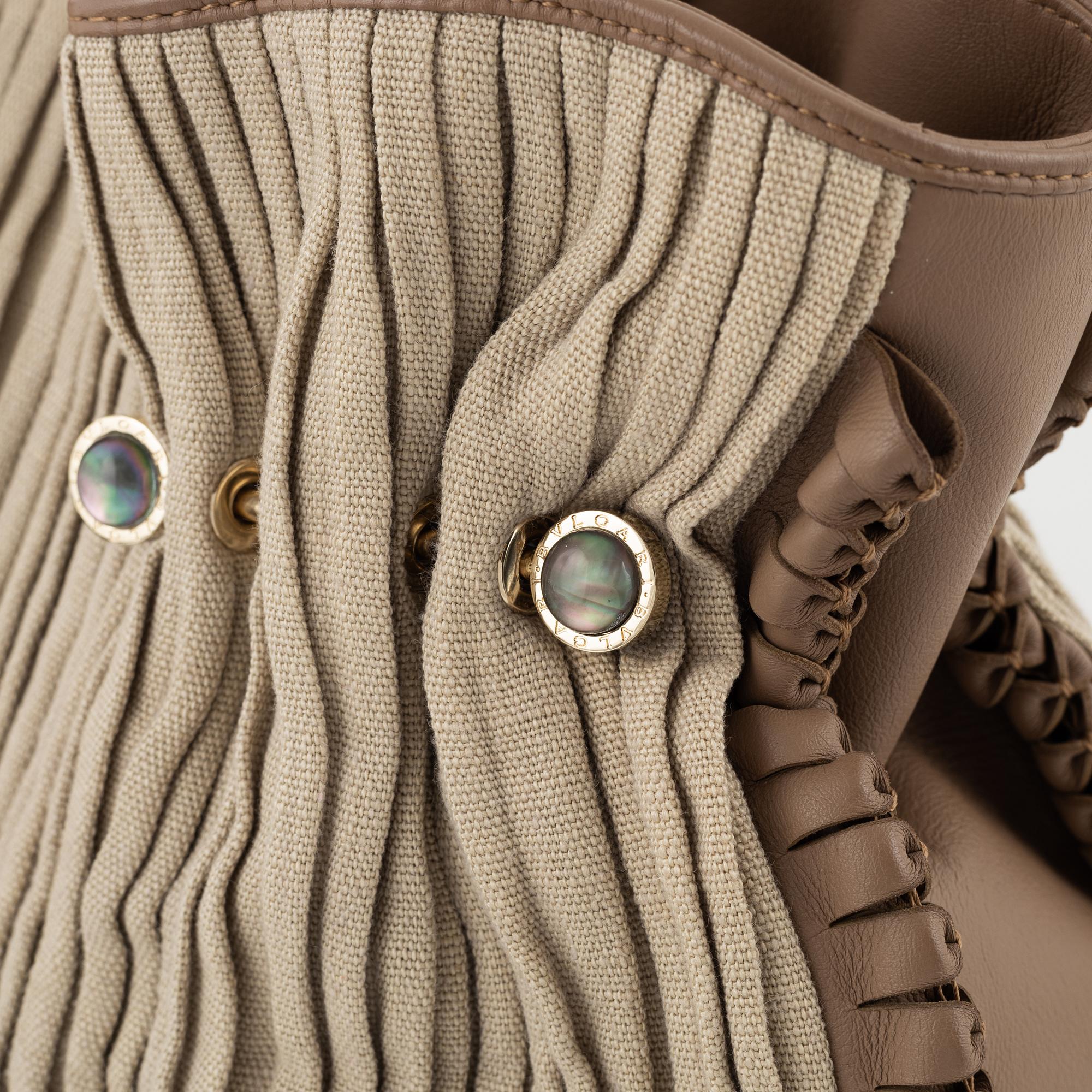 Bulgari, a leather and canvas bag.