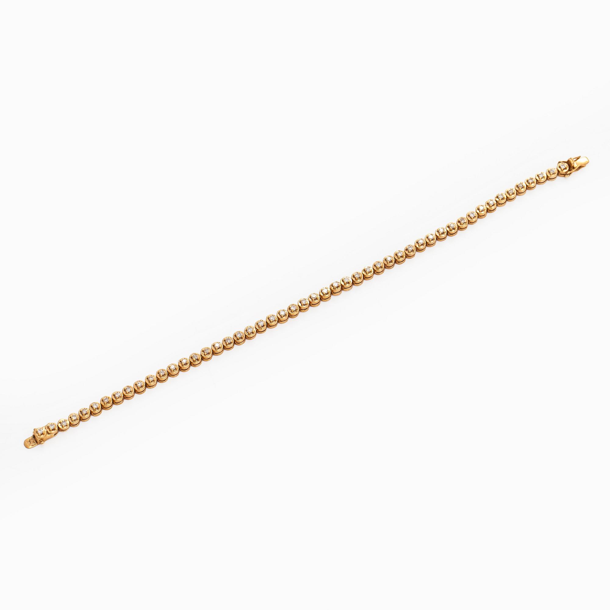 Armband, 18K guld och briljantslipade diamanter.