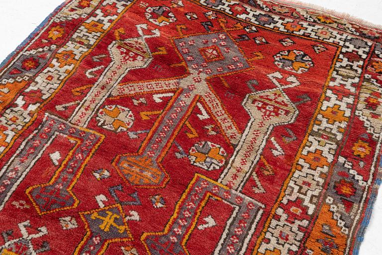 A semi-antique Anatolian rug, possibly Konya, approximately 152 x 117 cm.