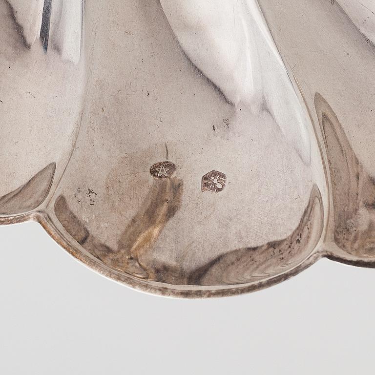A scalloped silver dish, Pasgorcy, Madrid, Spain, after 1934.