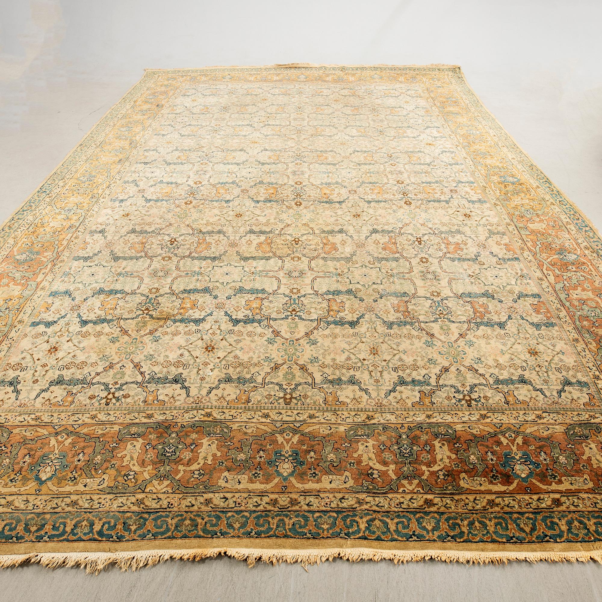 An antique West Persian carpet of Garrus design, c. 525 x 342 cm.
