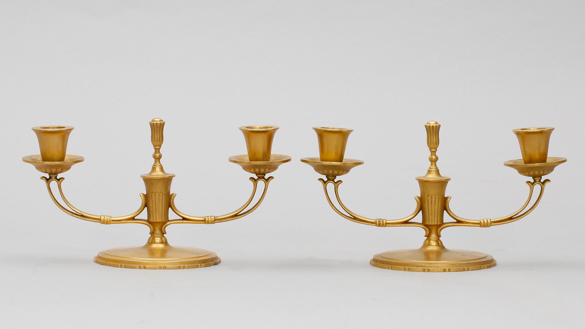 LJUSSTAKAR, ett par, förgylld brons, Art Déco, 1930/40-tal.