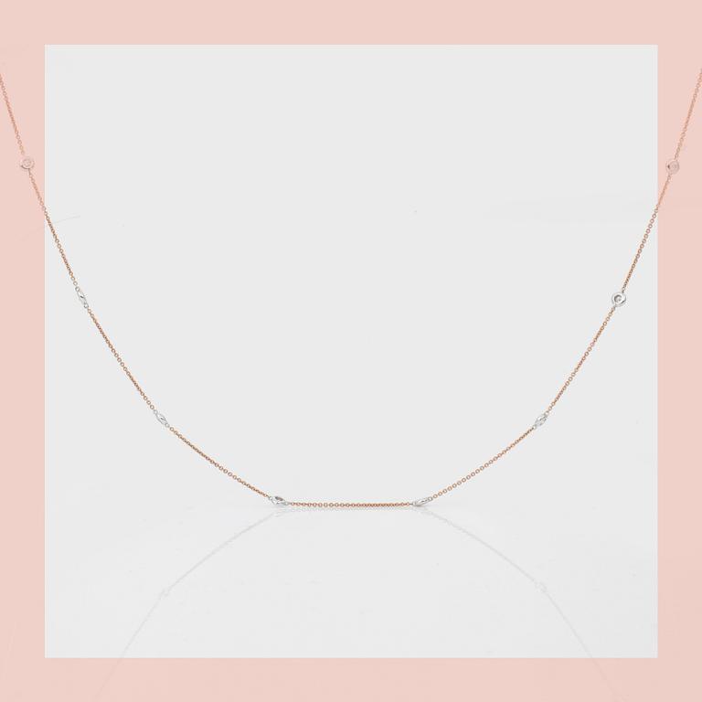 NECKLACE, a 90cm gold chain with 23 diamonds. total 1ct.