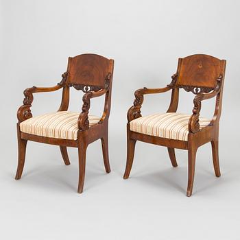 A pair Biedermeier armchairs from 1820s-40s.