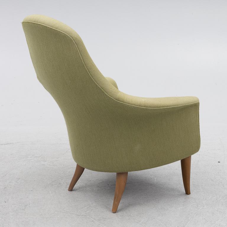 Kerstin Hörlin-Holmquist, a 'Stora Adam' armchair, Nordiska Kompaniet, Sweden, mid 20th Century.