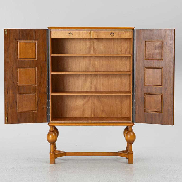 Eugen Höglund, a walnut cabinet, executed in his workshop in Vetlanda, Sweden 1950s.