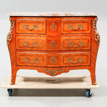 A rococo style chest of drawers, around the mid 20th century.