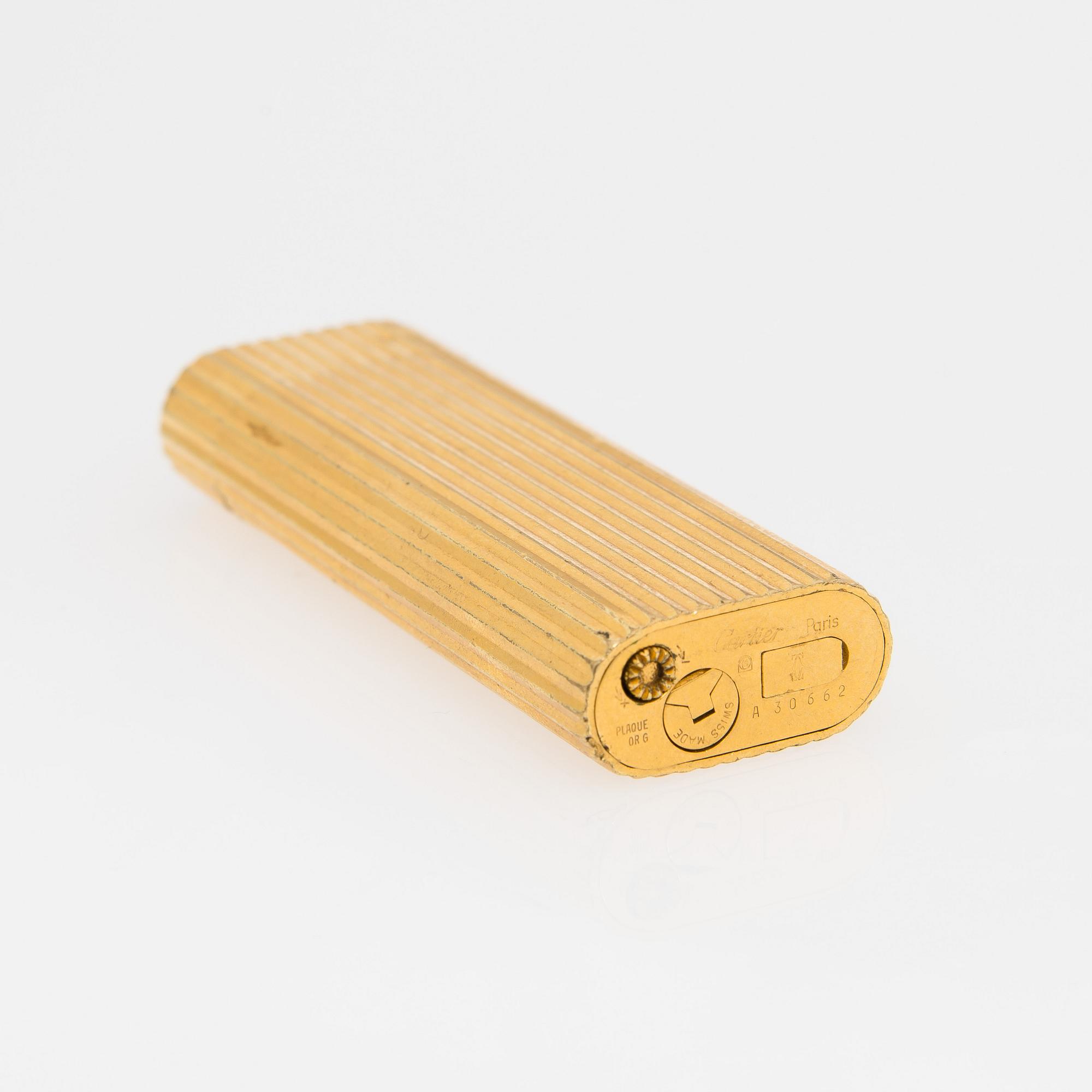 TÄNDARE, "Briquet Lighter", gulddoublé, Cartier.