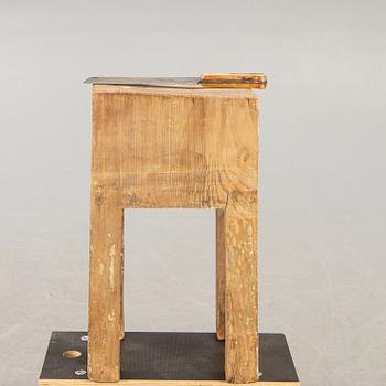 Huggkubb med köttyxa 1900-talets början.
