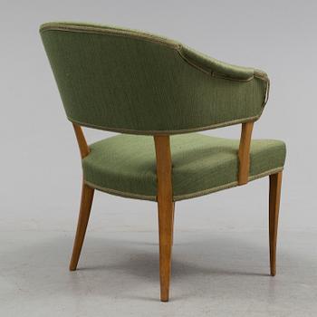 A "Lata Greven" armchair by Carl Malmsten.