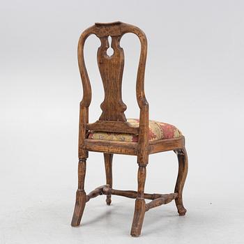 A rococo chair, mid 18th Century.