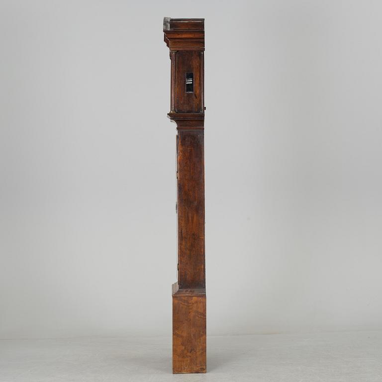 A WALNUT LONGCASE CLOCK, Benjamin Stretch, Bristol, 18th century.