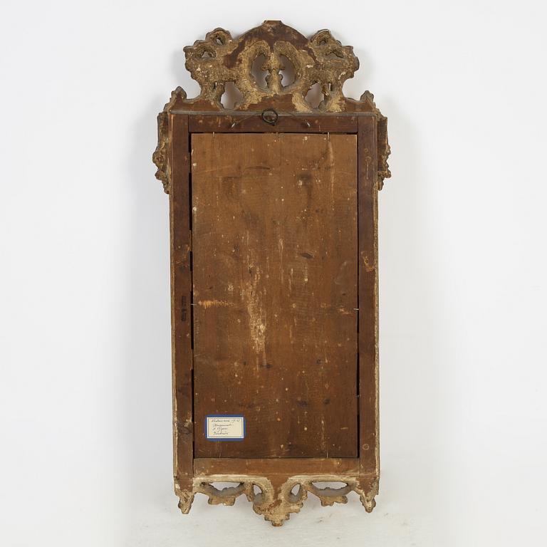 A Gustavian mirror by Johan Åkerblad, master in Stockholm 1758-99), signed.