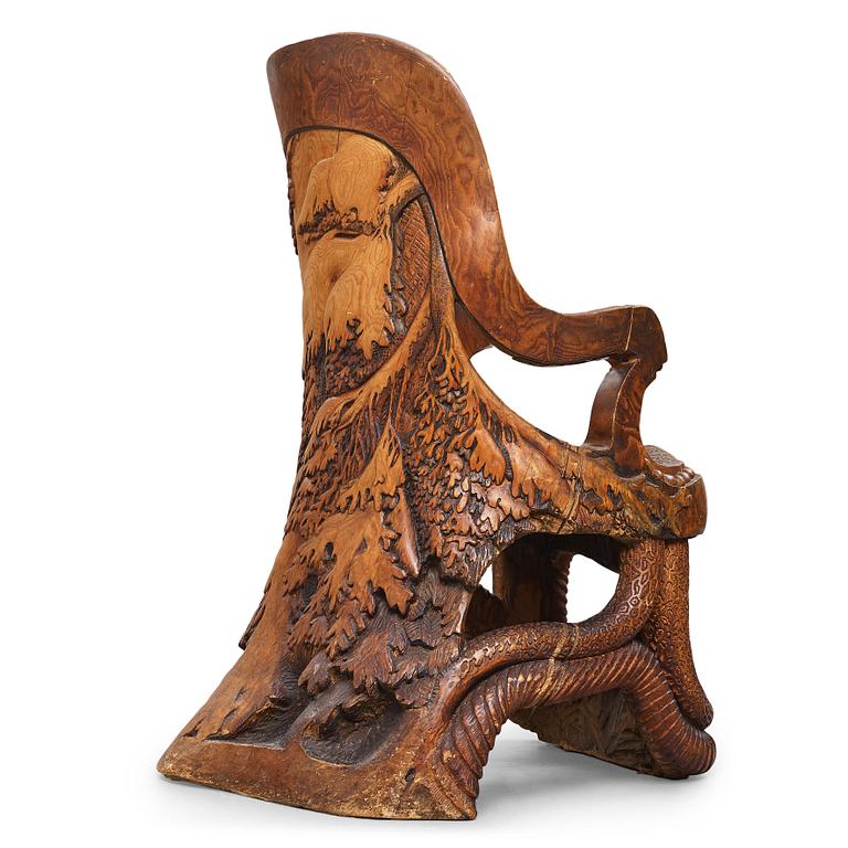 Knut Fjaestad, an Art Nouveau sculptured and carved pine throne, Sweden early 20th century.