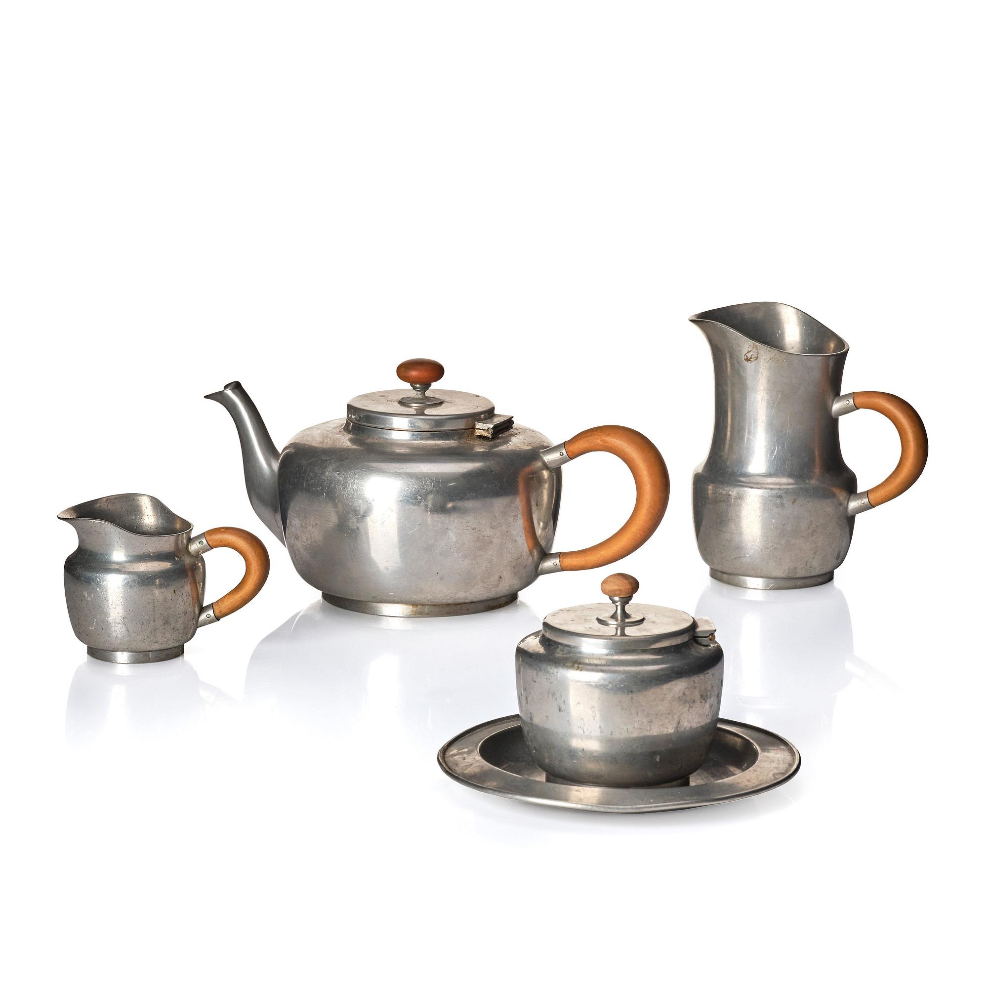 Josef Frank, a four pieces pewter tea service and a tray, model "A2330", Svenskt Tenn, Stockholm 1946 (tray 1929).