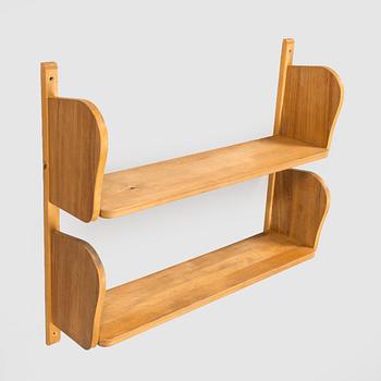 A mid-20th century 'Poika' wall shelf by HMN Huonekaluliike Mikko Nupponen.