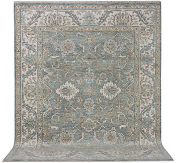 An oriental carpet with Mamluk design, c. 304 x 249 cm.