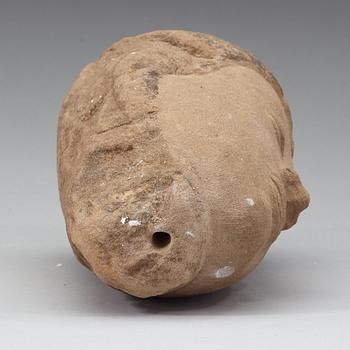 A Thai sandstone head of Buddha, 18/19th Century.