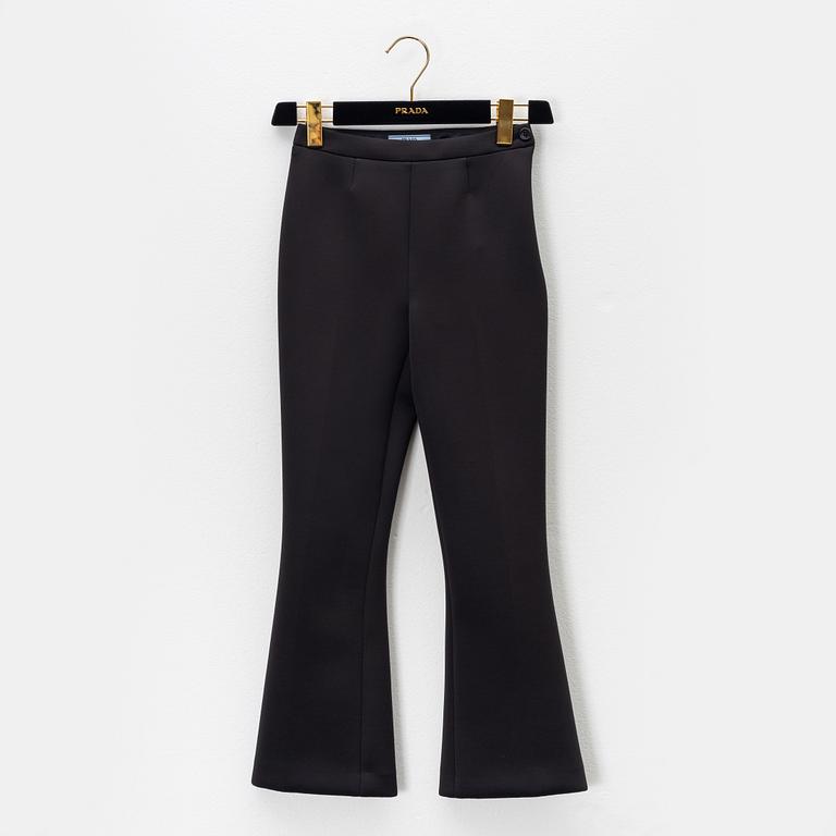 Prada, a pair of black scuba trousers, size 36.