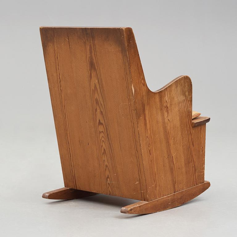 Axel Einar Hjorth, a stained pine "Lovö" rocking chair, Nordiska Kompaniet, Sweden 1930's.