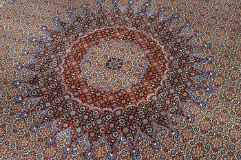 A Moud carpet, part silk, signed, c. 345 x 249 cm.