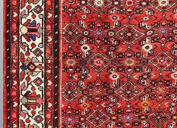 A Hosseinabad carpet, c 301 x 215 cm.