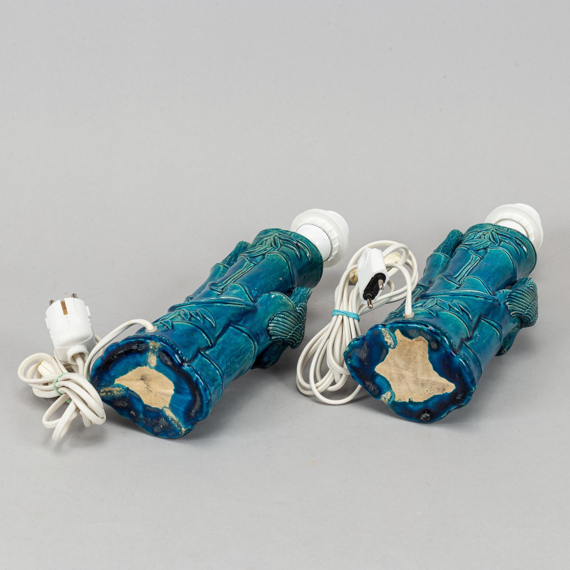 A pair of Chinese blue glazed porcelain table lamps/vases, early 20th century.