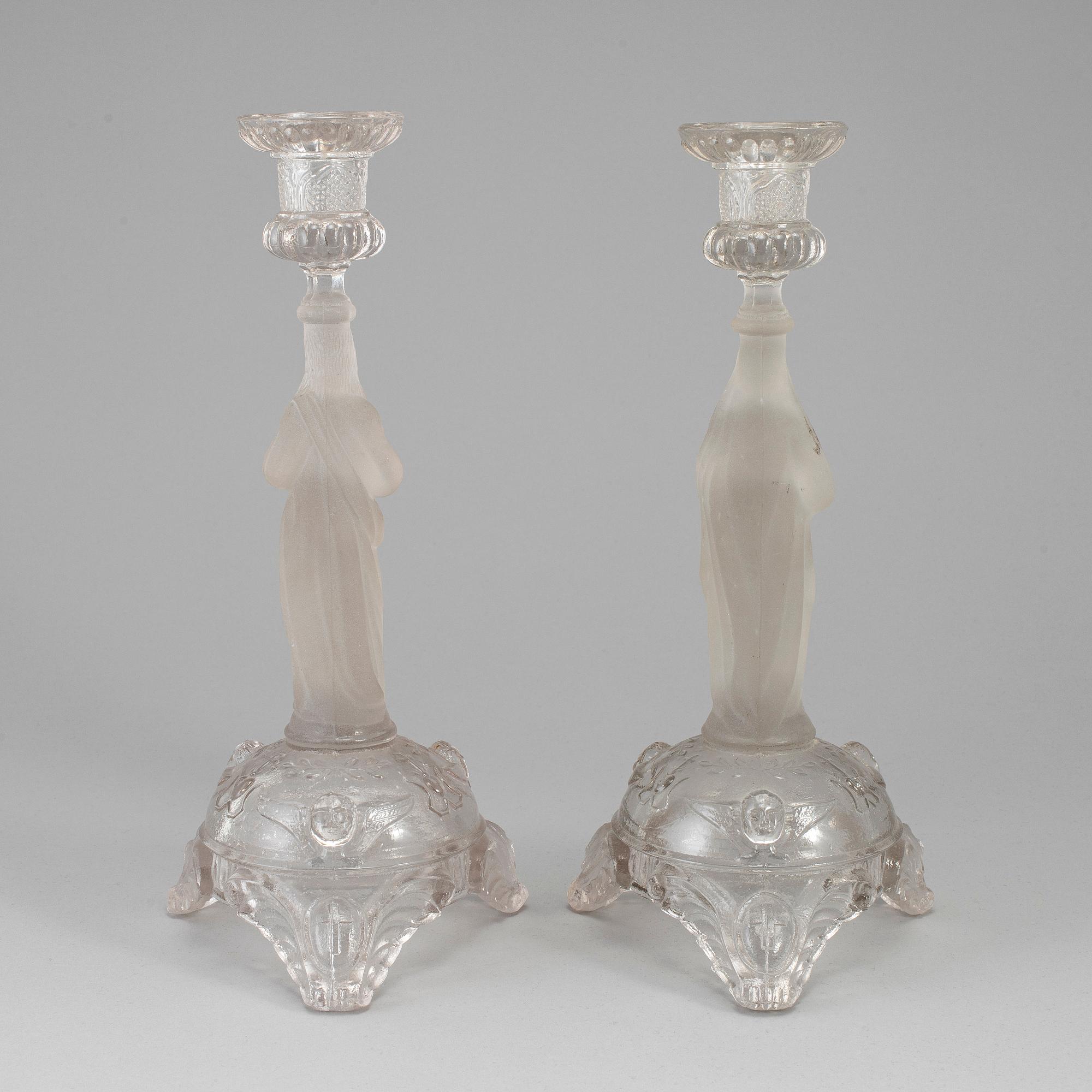 A pair of moulded glass candlesticks, late 19th century.