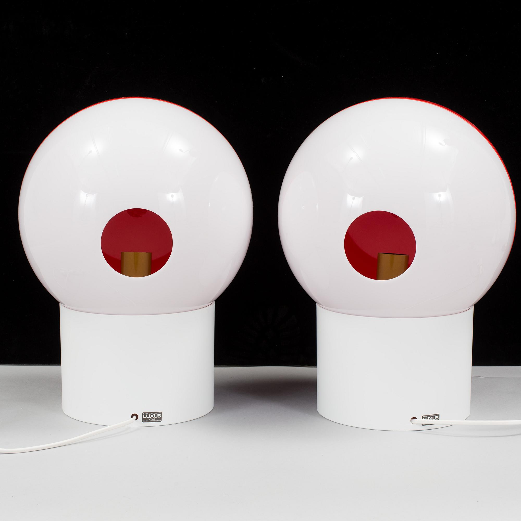 A pair of table lamps named "1241" or "Luno", designed by Uno and Östen Kristianss.