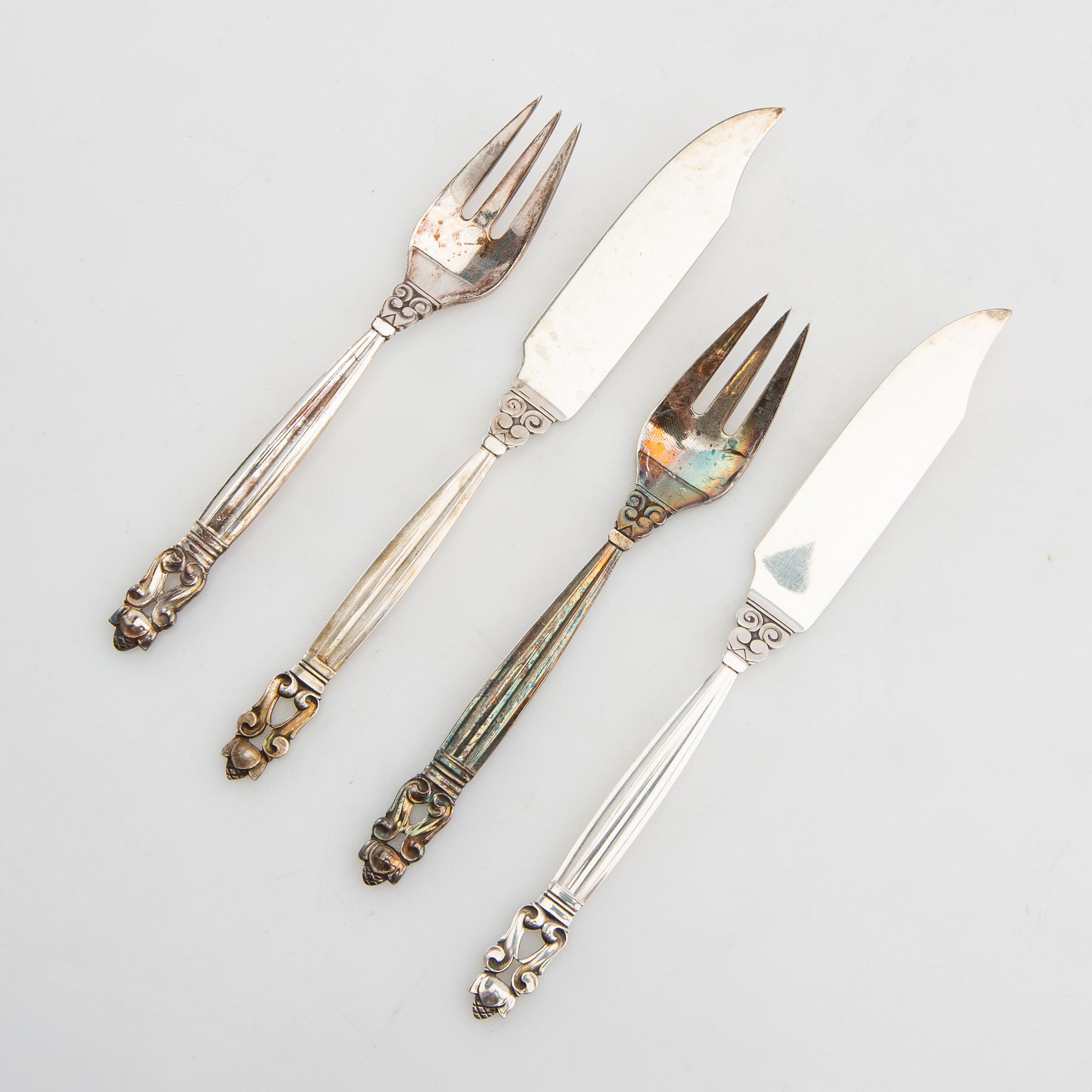 Johan Rohde, fiskebestick 12 dlr "Konge/Achorn" sterlingsilver för Georg Jensen efter 1945.